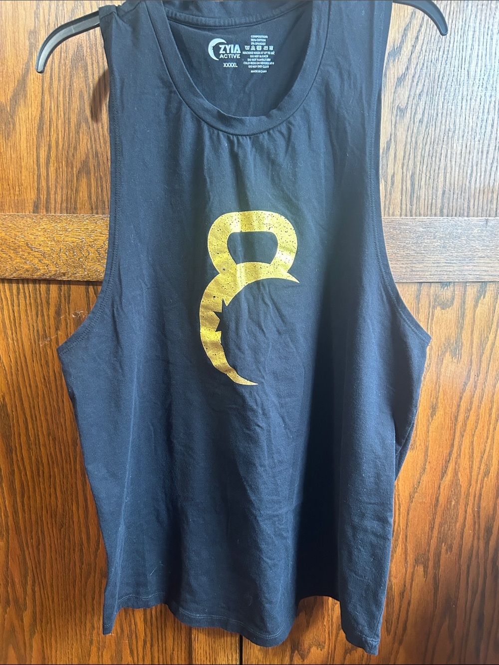 ZYIA Black Women's Crew Neck Top with Subtle Logo Print
